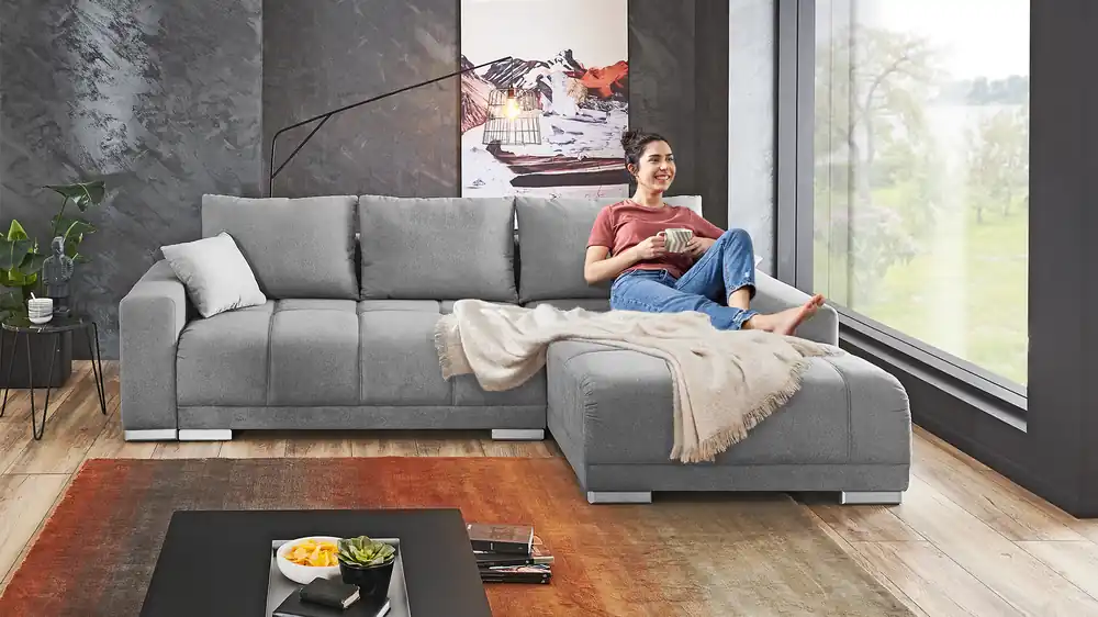 Ecksofa Carine mit Schlaffunktion und Bettkasten in Stoff Neue Kollektion