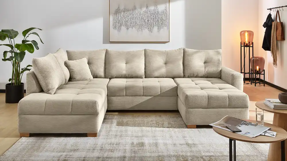 Wohnlandschaft Abby mit Schlaffunktion und Bettkasten in trendigen Cord Beliebt