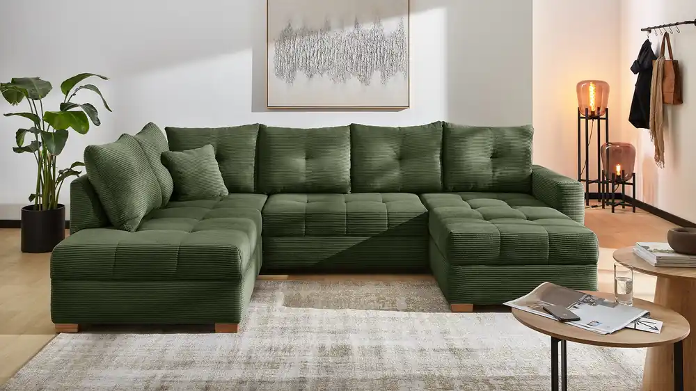 Wohnlandschaft Abby mit Schlaffunktion und Bettkasten in trendigen Cord Saisonangebot