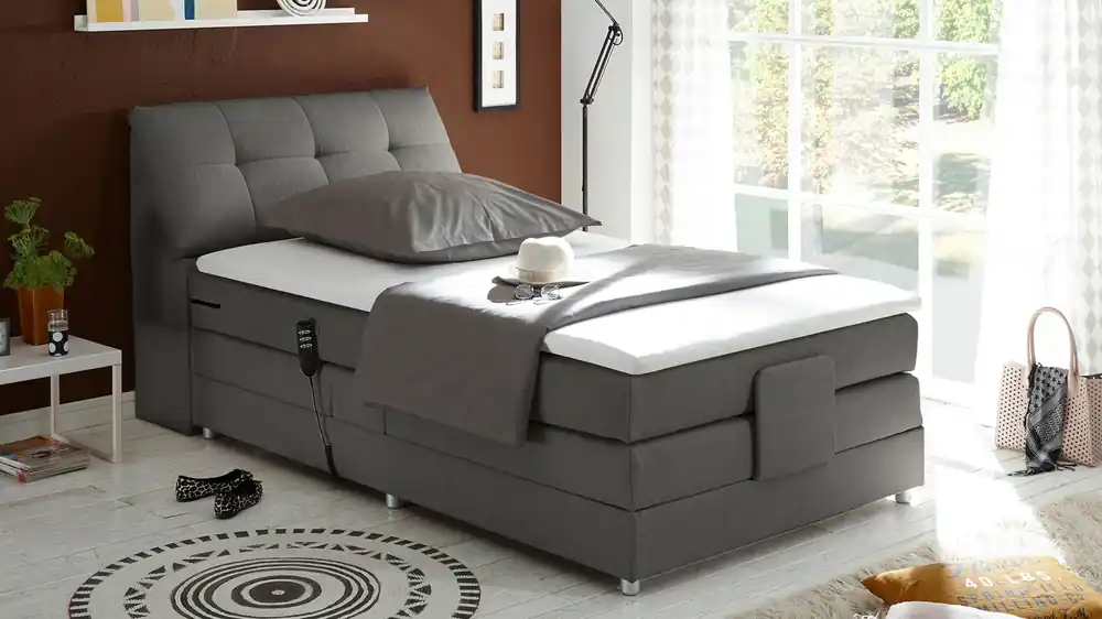 Begrenztes Angebot Boxspringbett Carpino mit motor. Verstellung und Stauraum